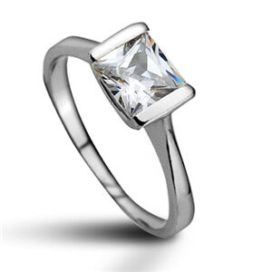 Dámský prsten z bílého zlata s čirými zirkony PR0535BF + DÁREK ZDARMA
